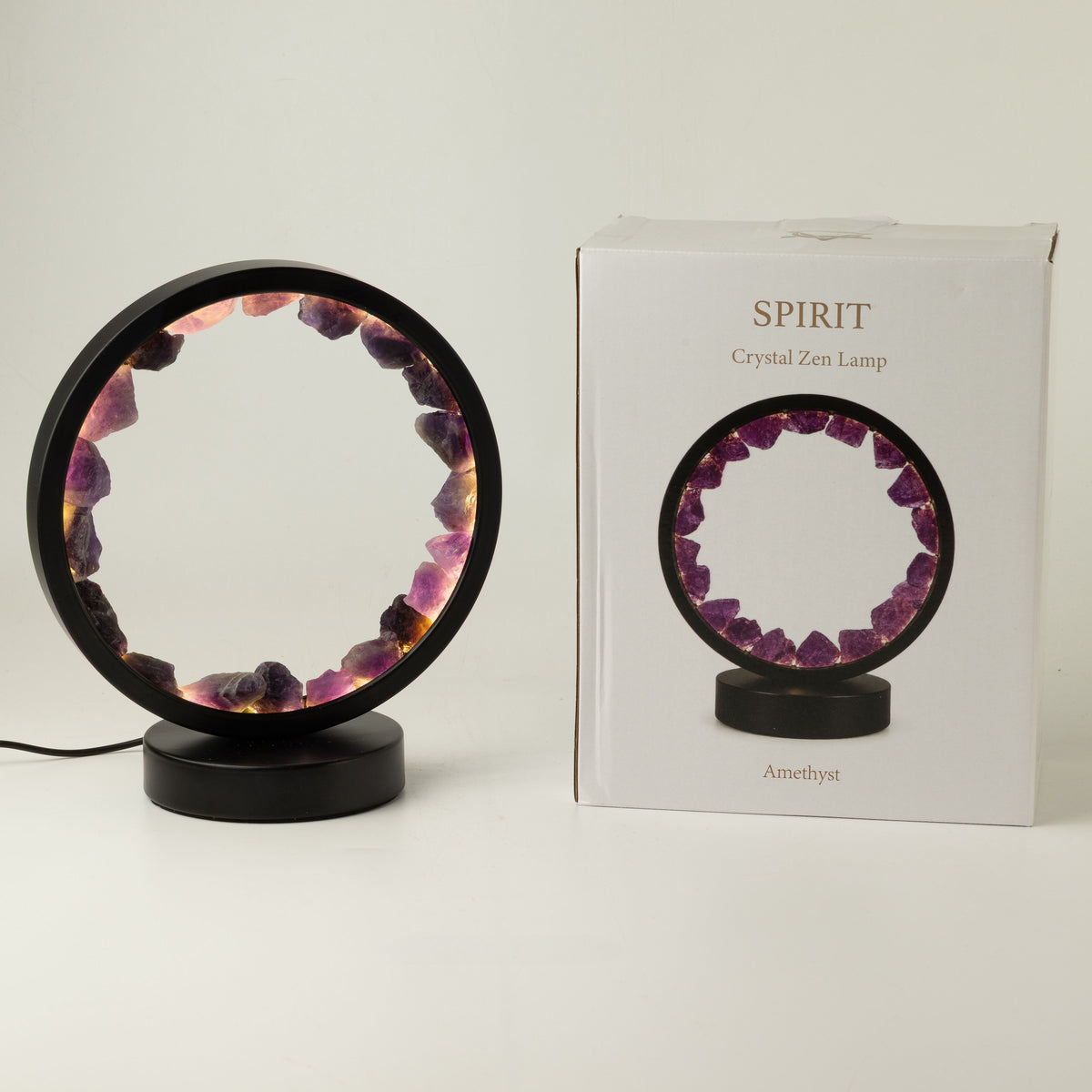 Amethyst halo lamp beside its product box