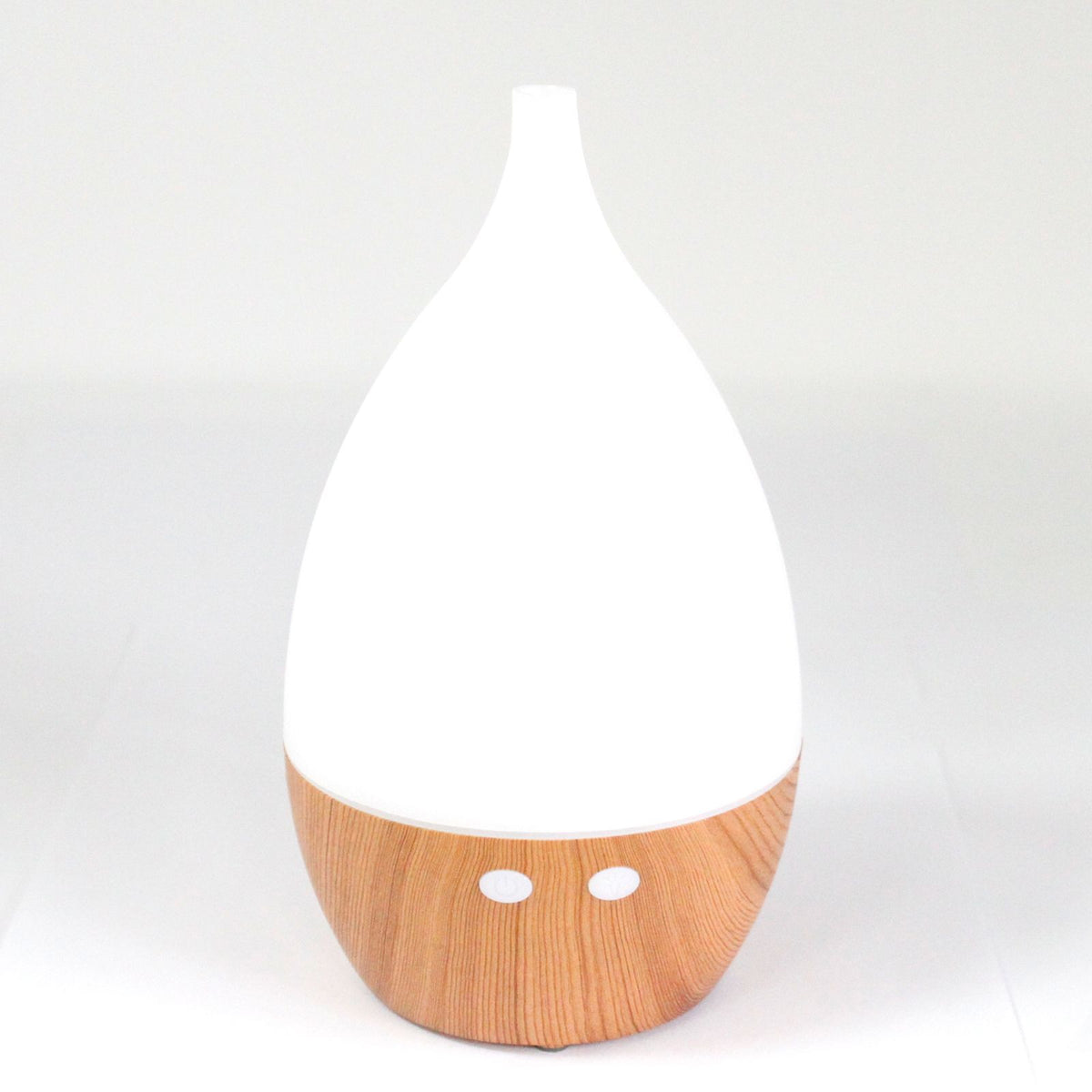 Milan Aroma Diffuser shown alone on a white surface, with its white top and light wood-effect base