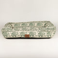 Front view of the green elephant-patterned bed