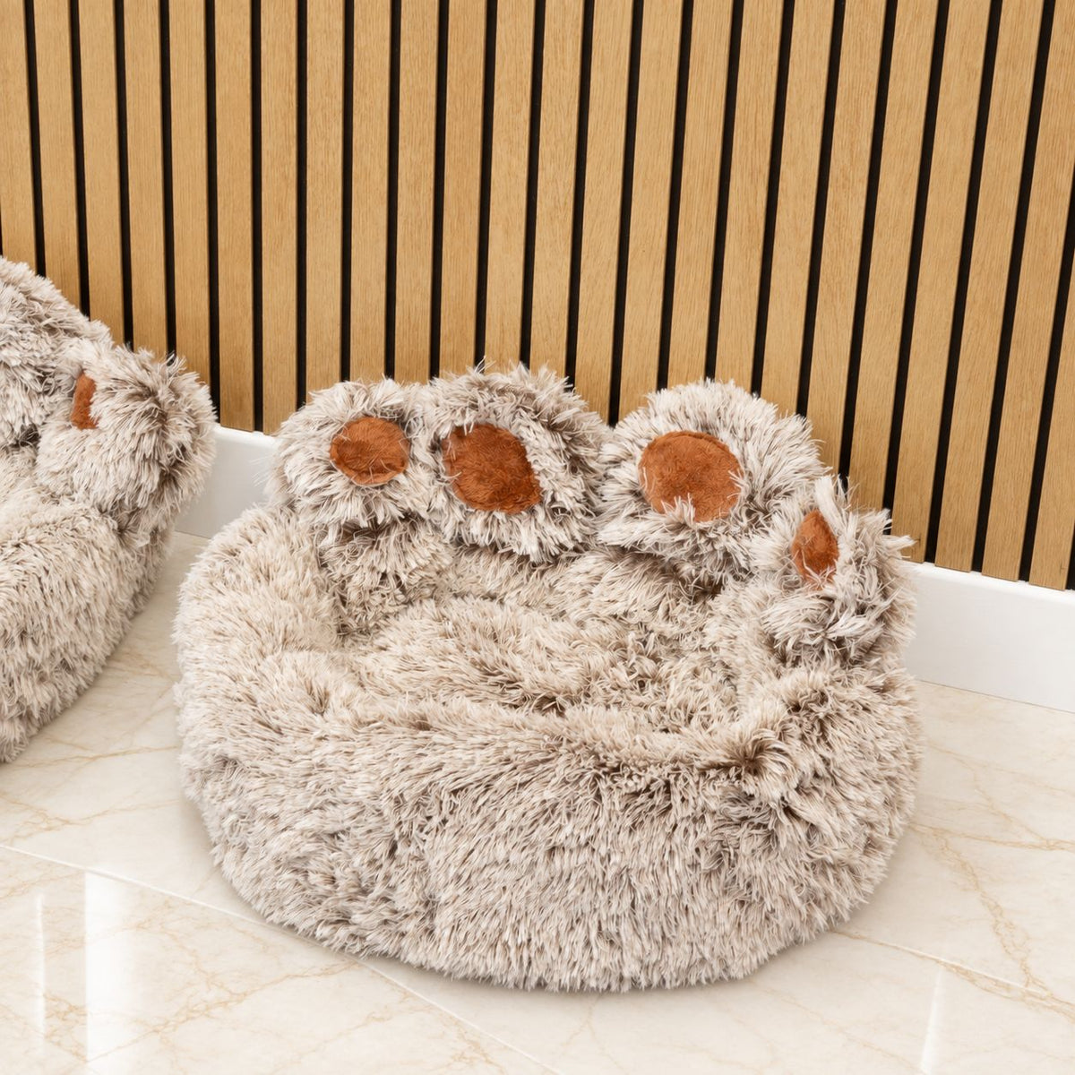Closer view of the paw-shaped bed and its raised toes