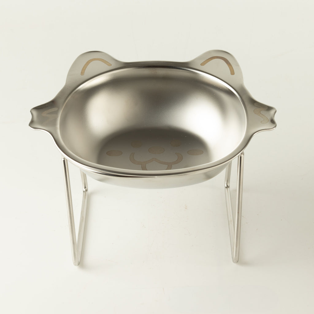 Front view of the cat bowl sitting in its metal stand