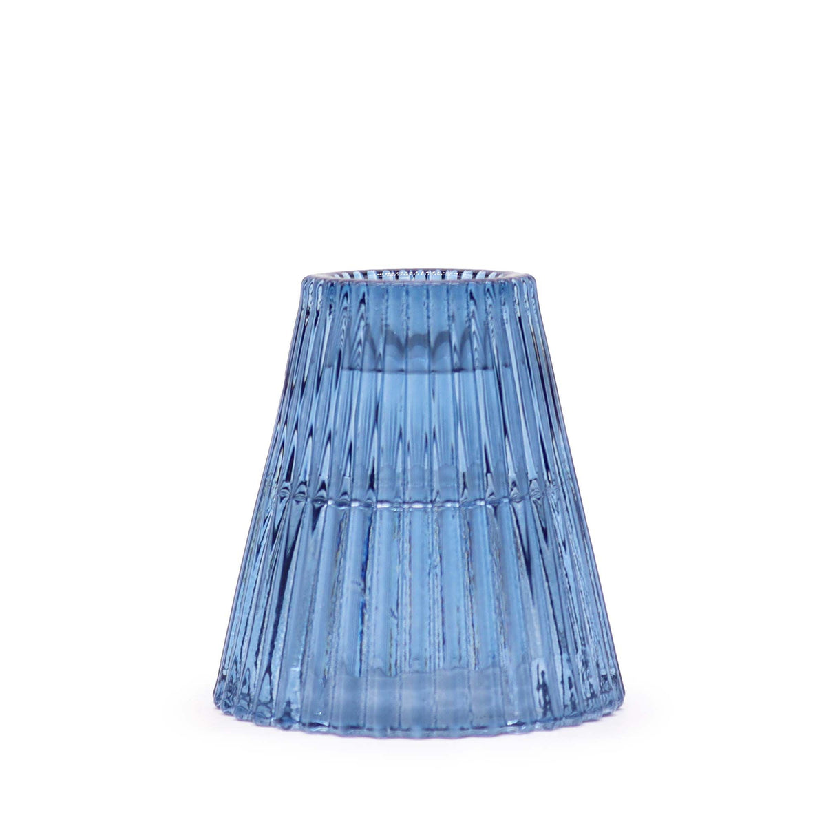 Royal blue ribbed glass holder shown empty and upside down, with its wide base facing upwards
