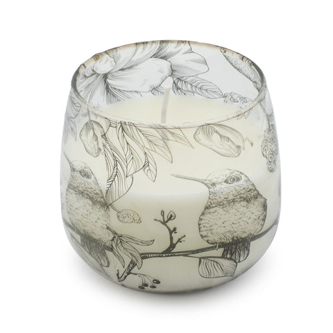 Medium Glass Jar Candle, Drawn by Flame, clear glass with bird and foliage illustrations, viewed from the front