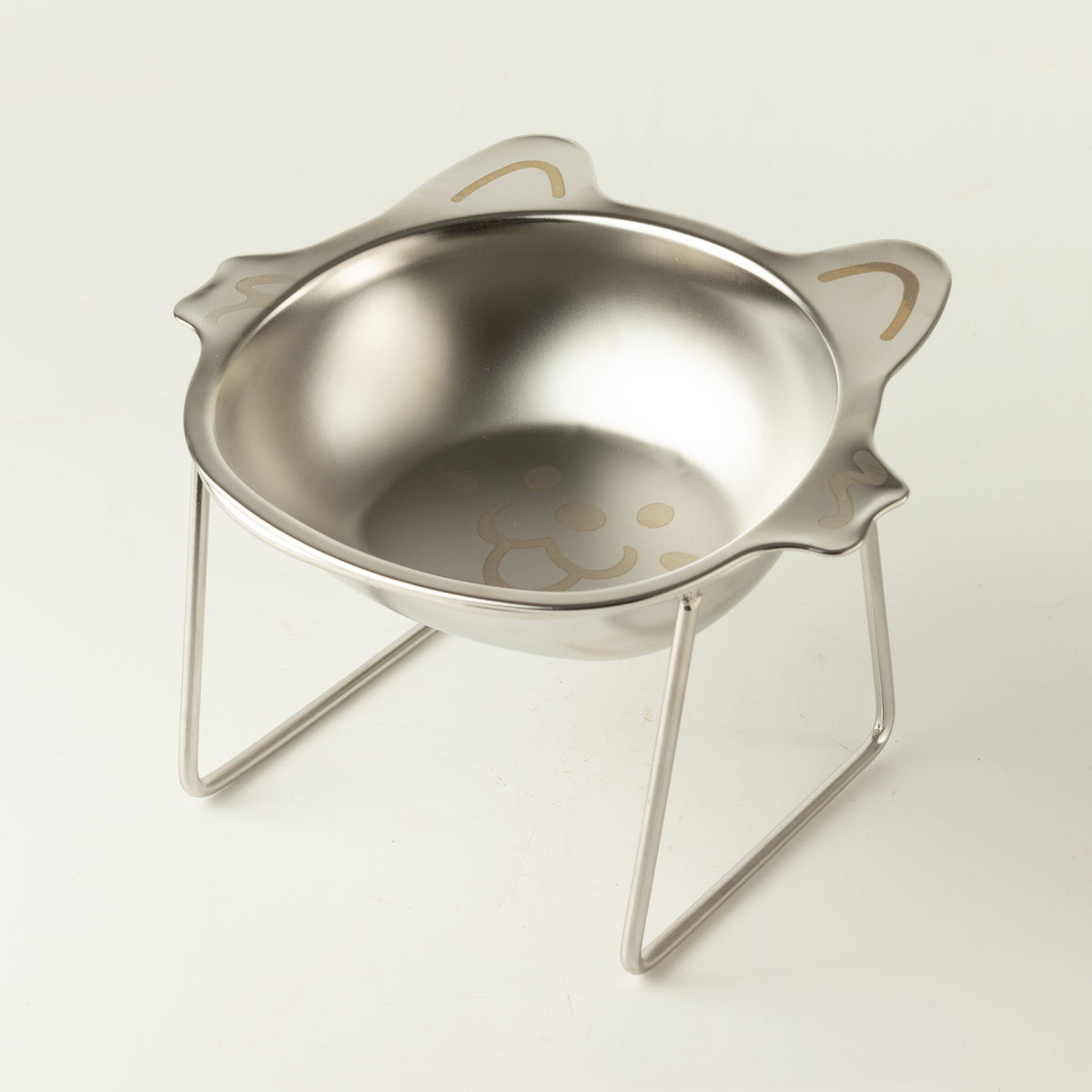 PAW raised cat bowl with pointed ears and a cat face inside