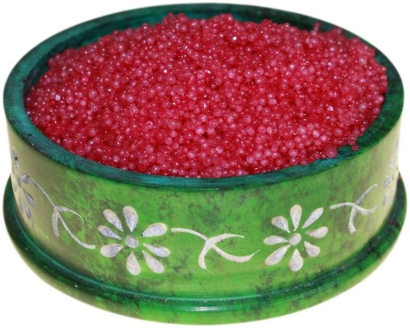 Cherry Grove Simmering Granules, bright pink granules filling a green floral bowl, viewed close up