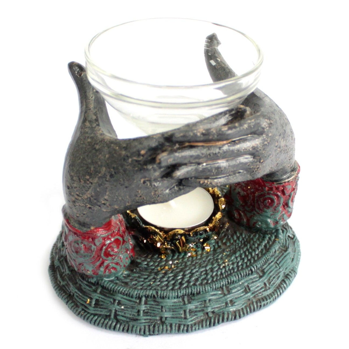 Offering Hands Oil Burner: two dark grey resin hands holding a glass dish, on a woven green base