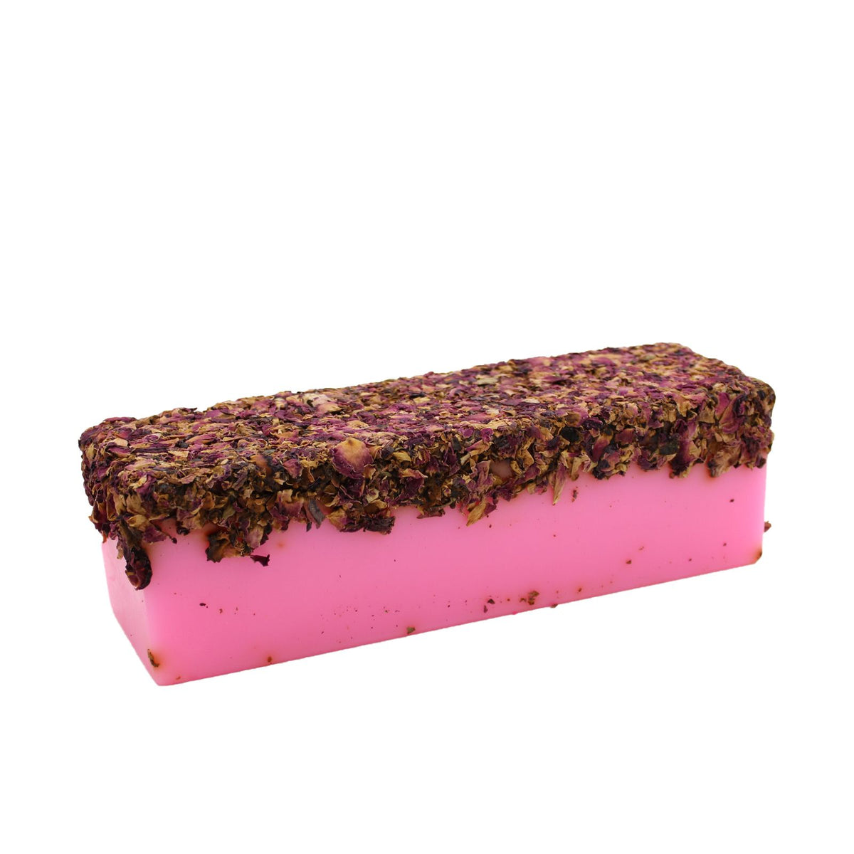 Rose soap loaf shown whole from the side, with a bright pink base and a rough petal-covered top