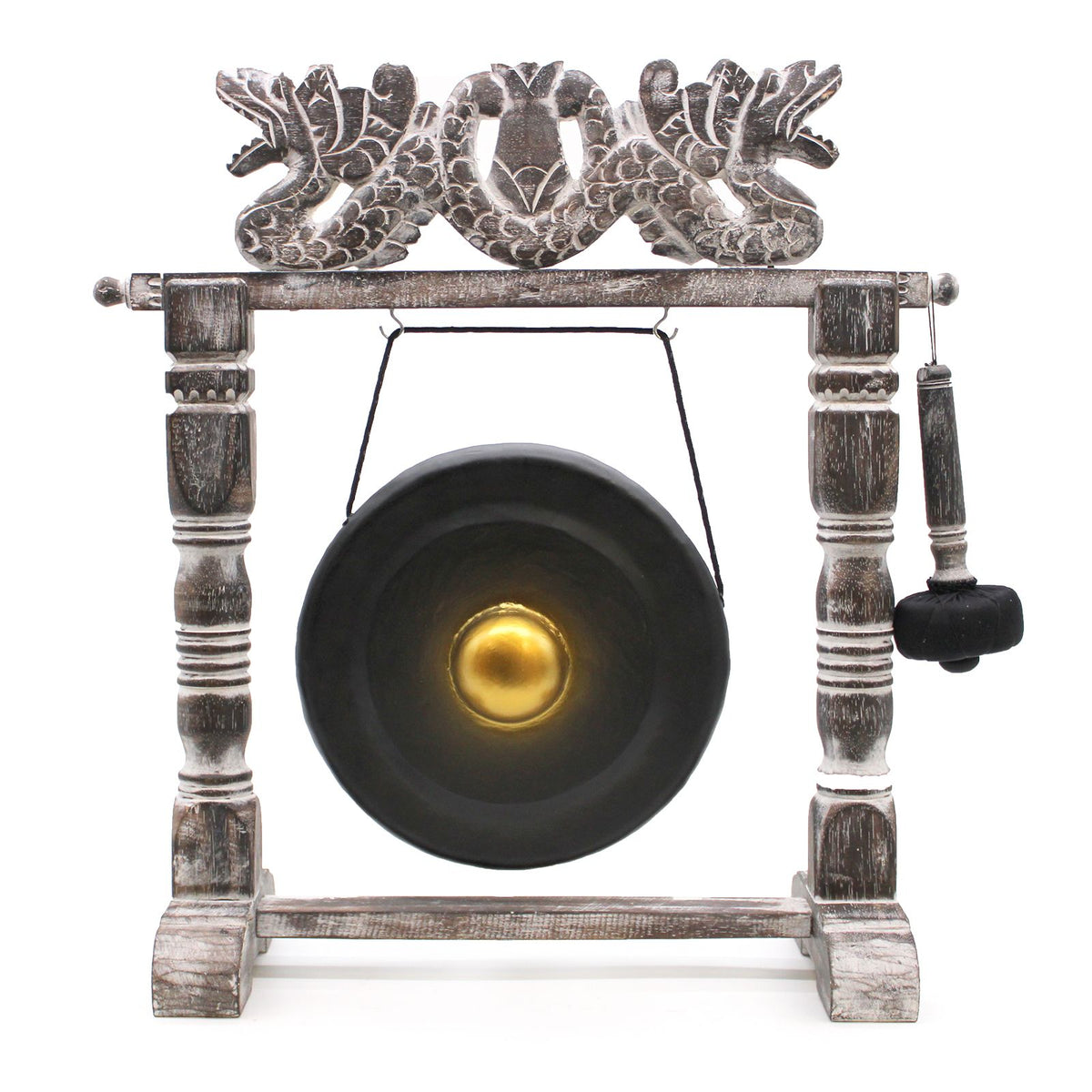 Small black gong in its carved stand, shown from the front