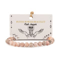 Petite Pink Jasper bracelet with beads displayed on its illustrated card