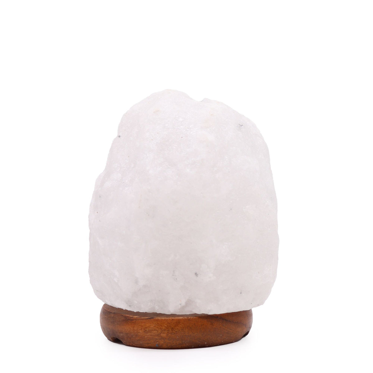 Himalayan salt lamp, single pale rock on a round wooden base against a white background