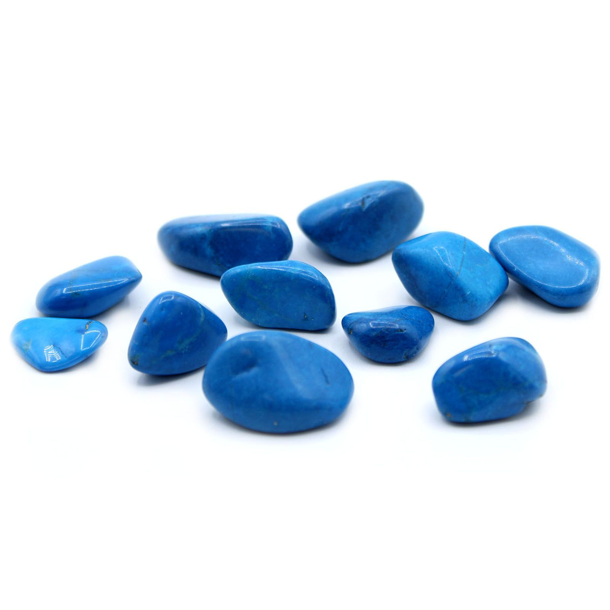 M Tumble Stone, Blue Howlite, a group of polished blue stones shown together on a white background