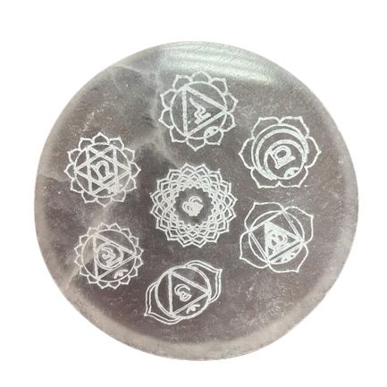 Chakra charging plate shown from above on a white background, with seven white symbols