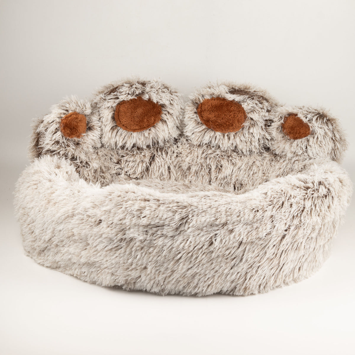 Front view of the paw-shaped bed