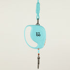 Paw retractable dog lead with shaped casing and rope wrist strap