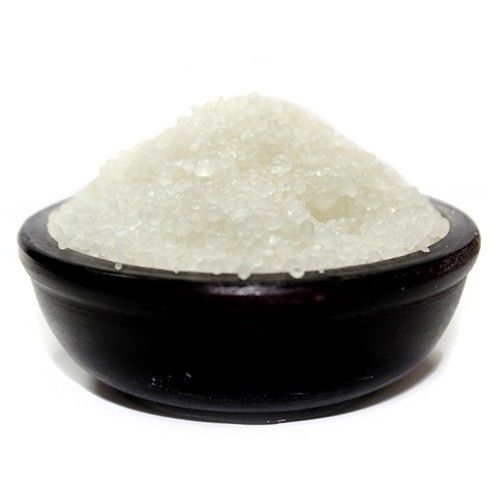 Hallway, Let Angels Pass simmering granules piled in a dark bowl against a plain white background