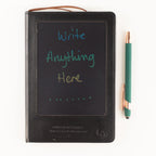 Black notebook screen with colourful handwriting beside a pen