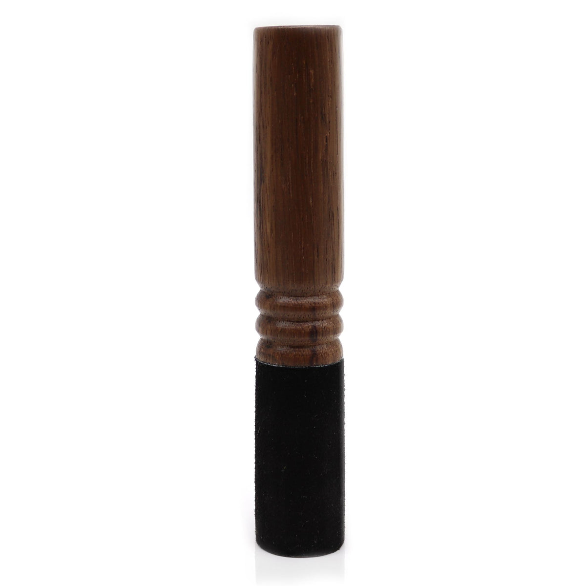 Classic singing bowl stick shown upright, with a dark brown ridged handle and black end