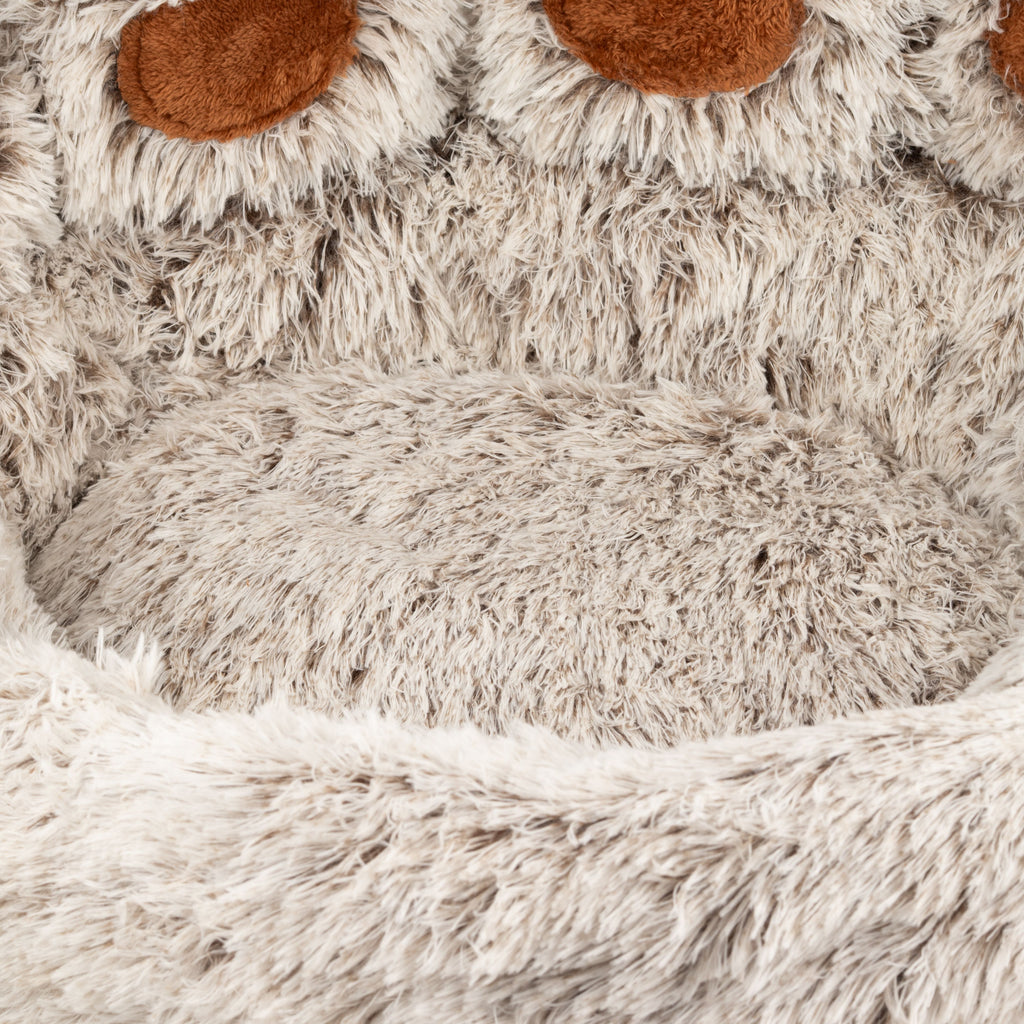 Close view of the plush bed centre and raised toes