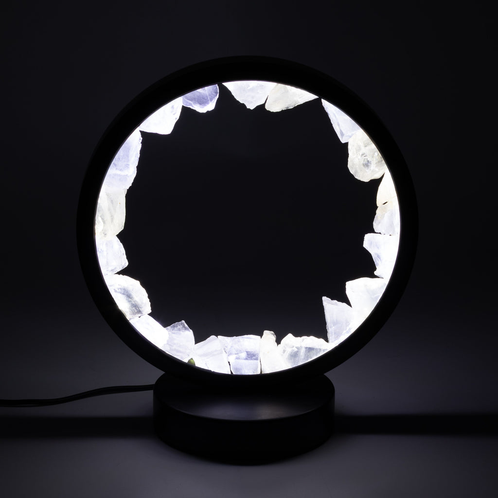 Clear quartz halo lamp glowing against a dark background