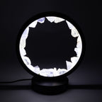 Clear quartz halo lamp glowing against a dark background
