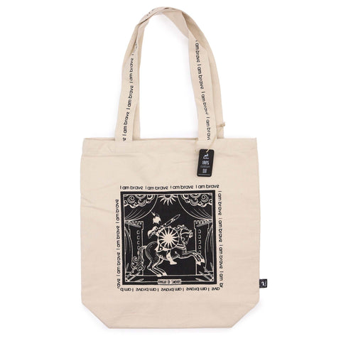 Cream cotton tote bag printed with the black Knight of Swords tarot card design