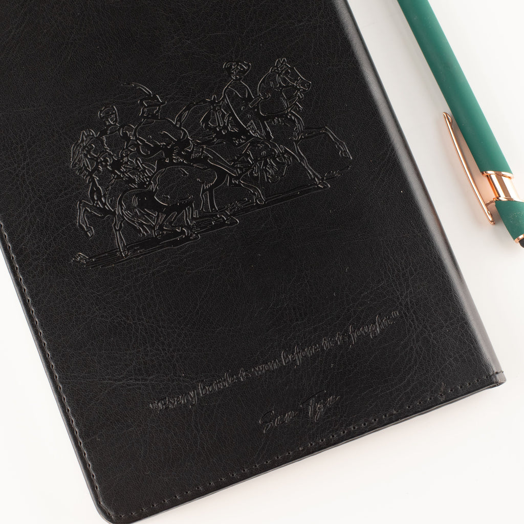 Embossed black leather-effect notebook cover with stitched edge