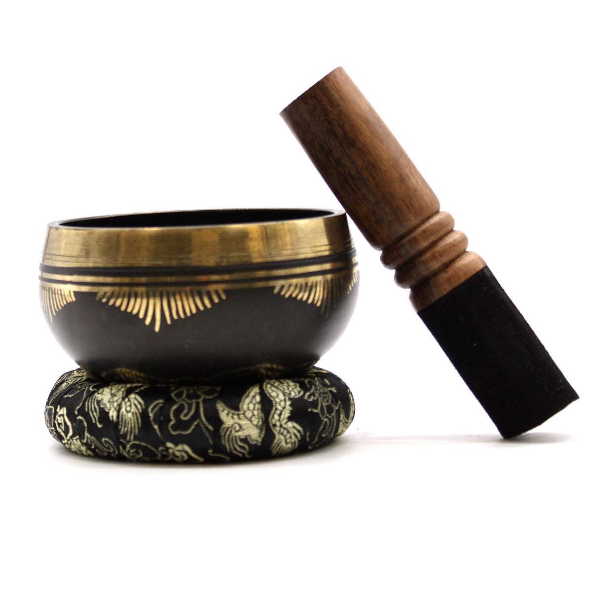 Flower Of Life Sing Bowl Set with a black and gold bowl, patterned cushion and wooden striker on white