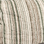 Close-up of the bed's textured striped fabric