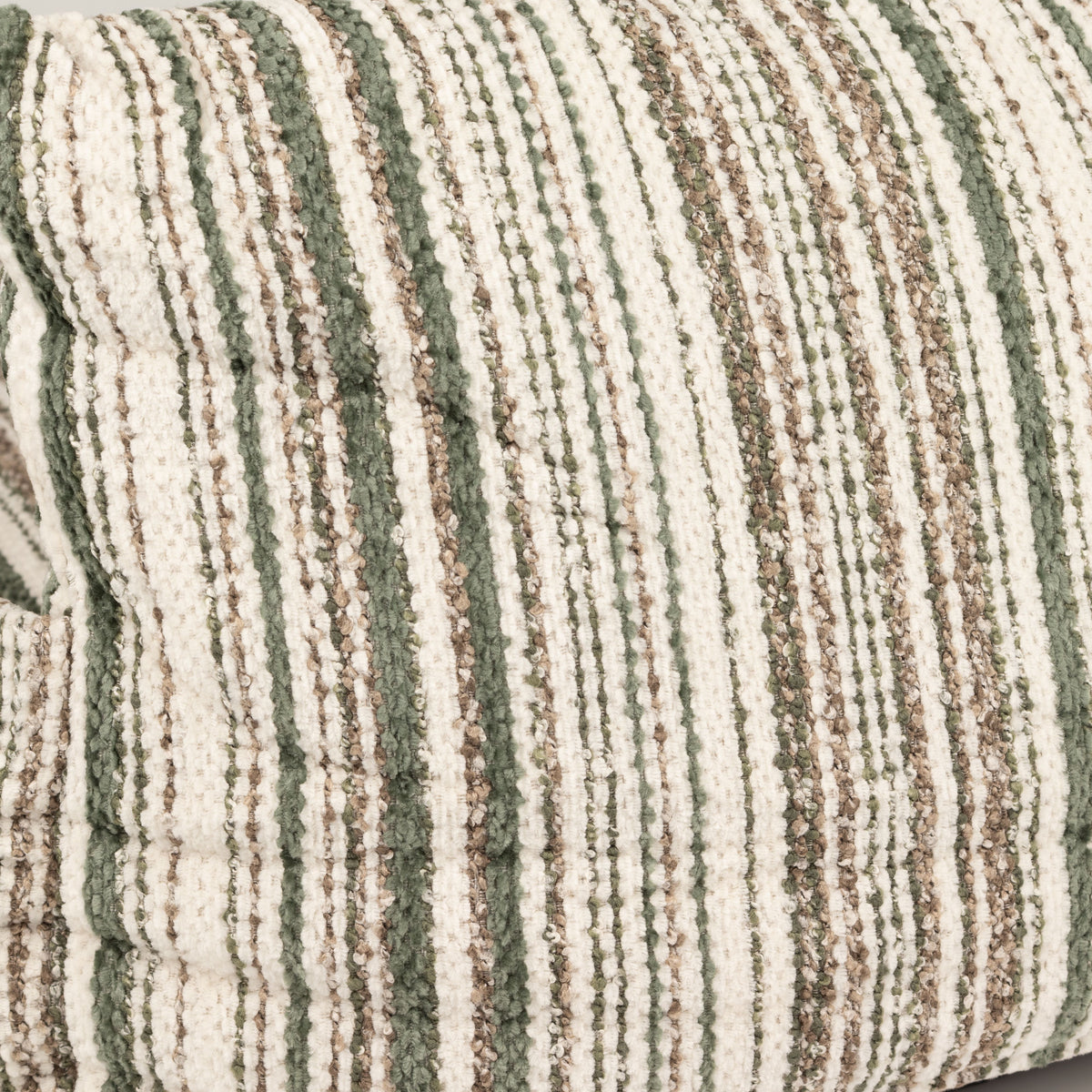 Close-up of the bed's textured striped fabric