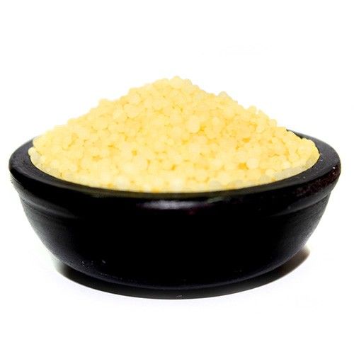 Bathroom, Daisy Fresh simmering granules in a black bowl, shown close-up against a white background