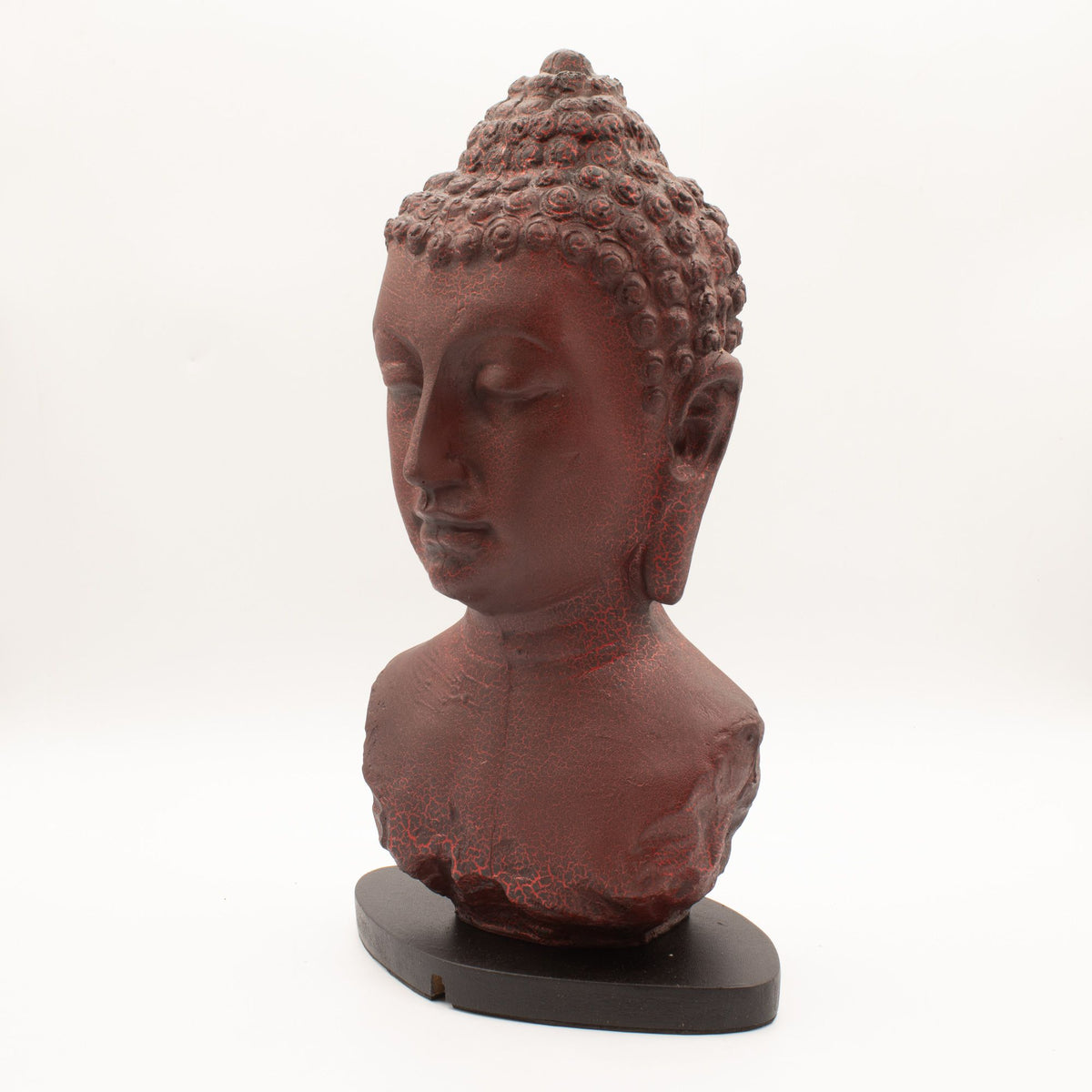 Buddha Bust Lamp Molton Lava, Oval stand, reddish bust on a black oval stand, angled front view