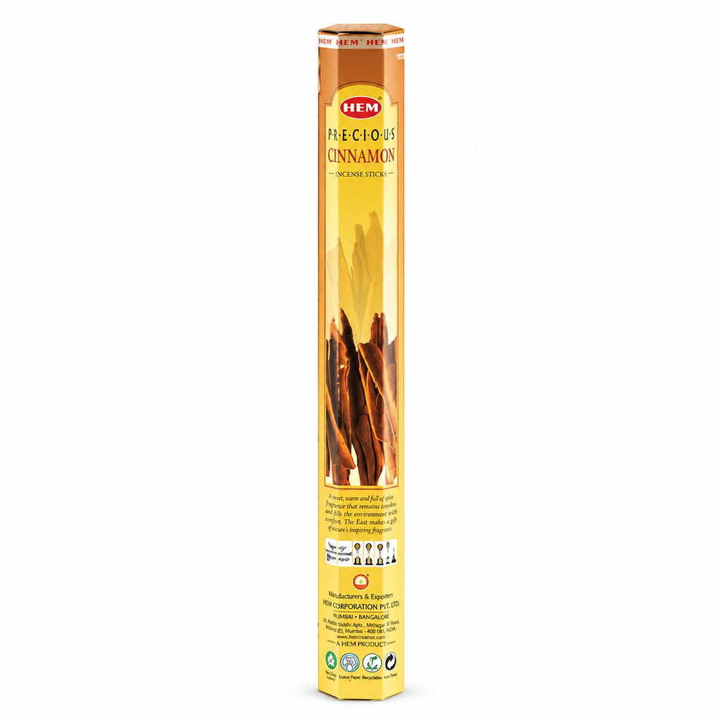 HEM Precious Cinnamon incense in its tall yellow and orange pack
