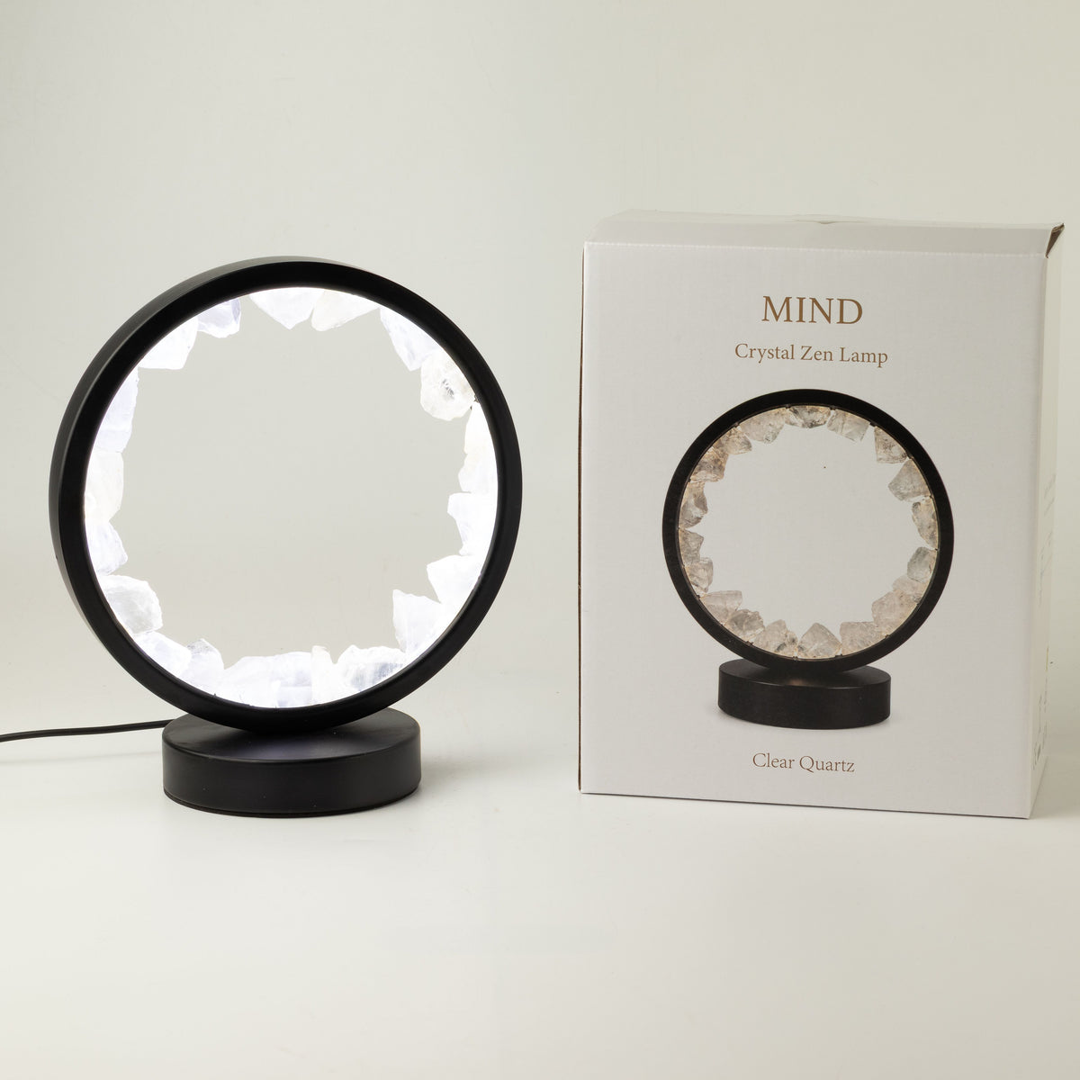 Lamp displayed beside its box marked Mind and Clear Quartz