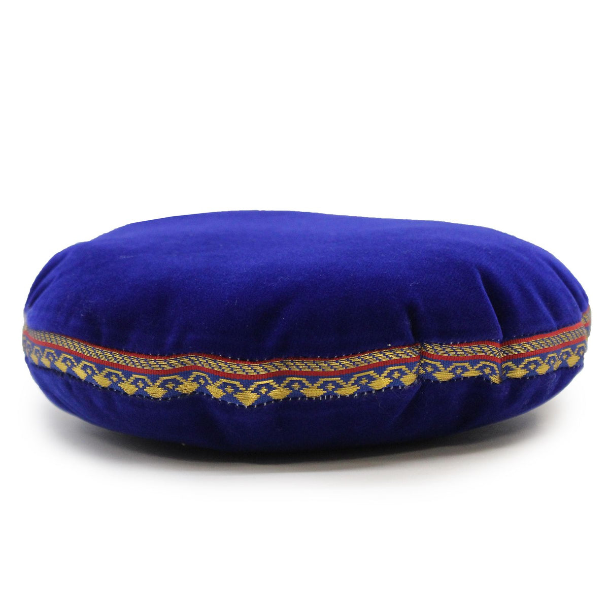 Royal blue velvet singing bowl cushion shown alone, with a colourful woven trim