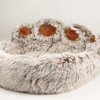 Close view of the bed’s raised toes and plush edge