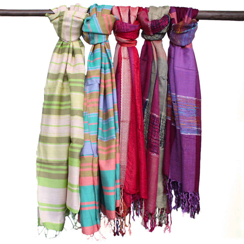Five folded Indian boho scarves in different colourways hanging from a rail, showing the range's variety, not one exact scarf