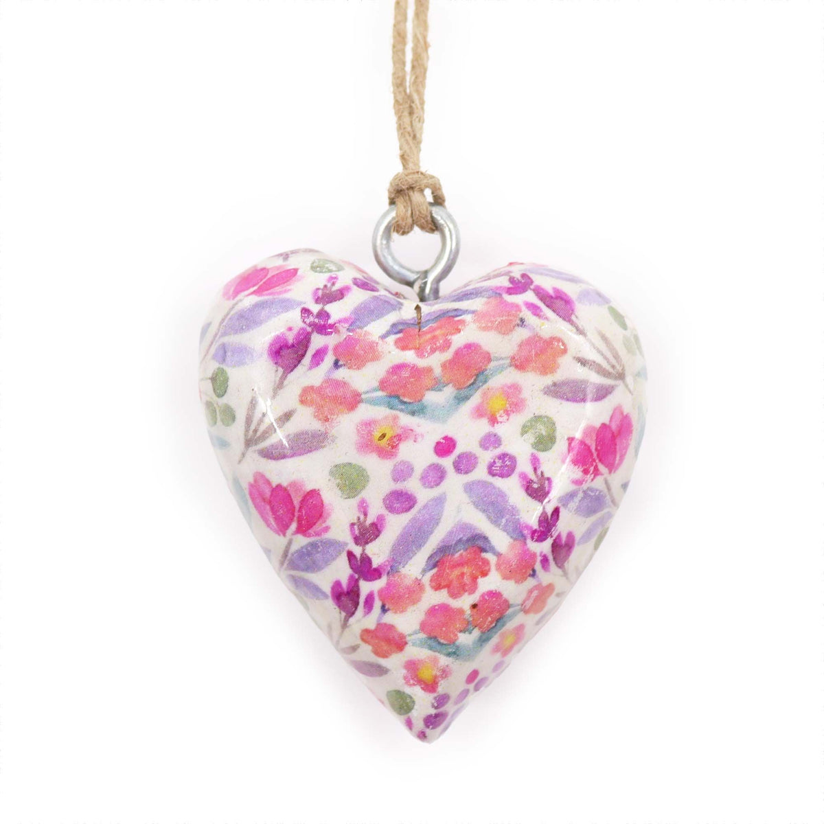 Pretty Floral wood heart hanging from a cord, shown close up against a plain white background
