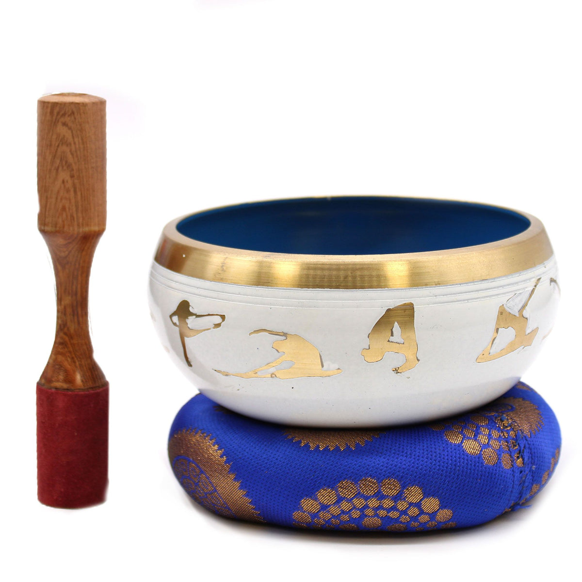 White singing bowl with gold yoga poses on a blue patterned cushion, wooden striker alongside
