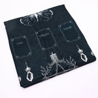 Folded cloth showing the butterfly and card positions