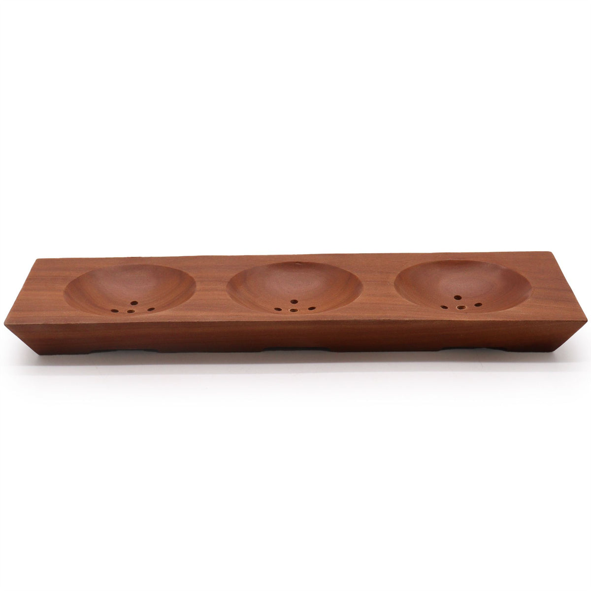 Mahogany soap dish shown from a low front angle, with three empty rounded wells and drainage holes
