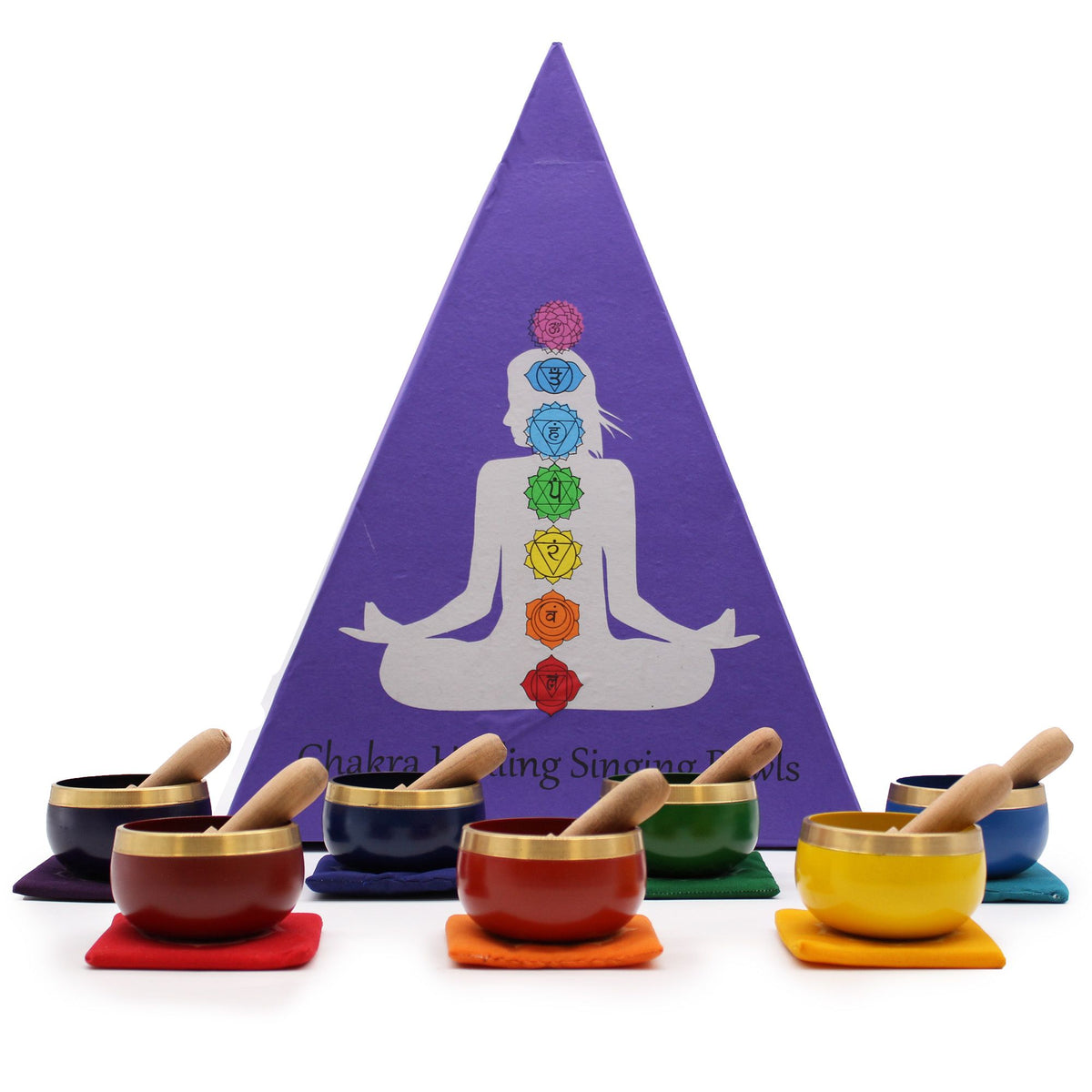 Chakra Pyramid Singing Bowl Gift Set, seven coloured bowls and wooden beaters before the closed purple box