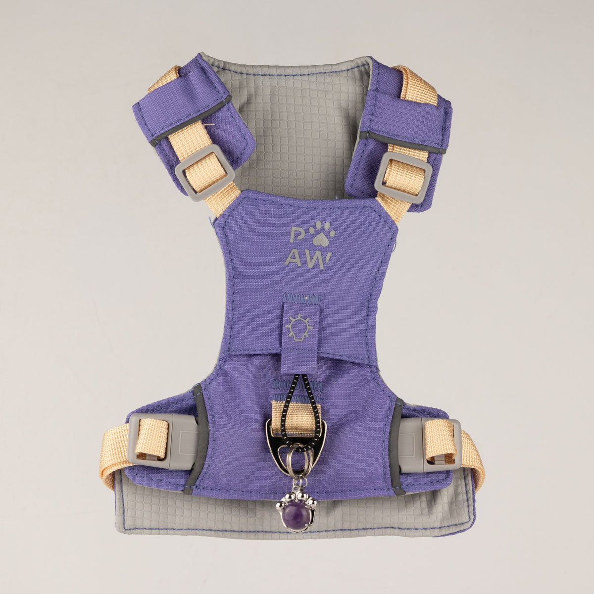 Front view of the harness showing its straps and back lead ring