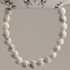 Close view of the Howlite bracelet's marbled beads