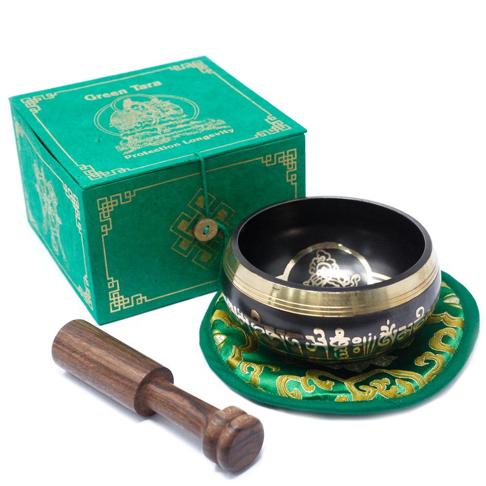 Green Tara bowl set with closed green box and wooden striker, bowl resting on its patterned cushion