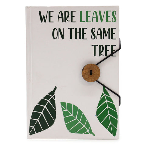 Notebook with strap, Leaves on the same tree, white cover with green leaf prints and a black elastic cord