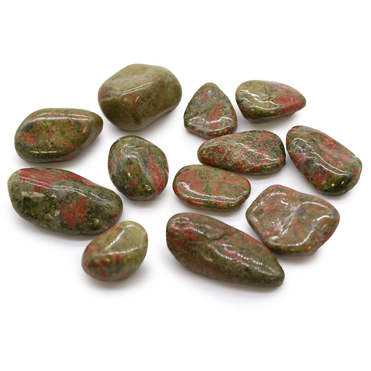 Medium African Tumble Stones, Unakite, a group of polished green and reddish stones on white