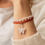 Blood Moon bracelets layered on a wrist