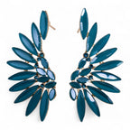 Teal green vintage glass angel wings earrings, pair shown from the front against a white background