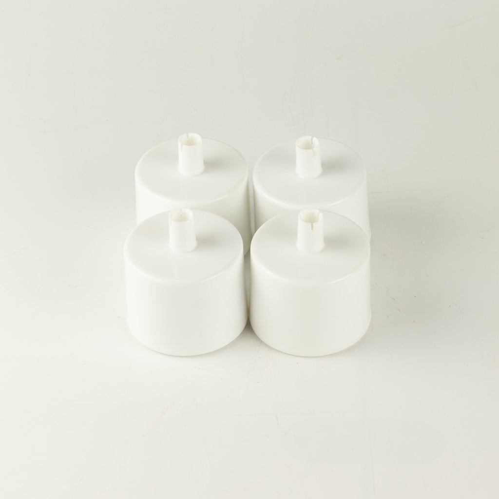 PAW water fountain replacement filters, four white filters grouped together