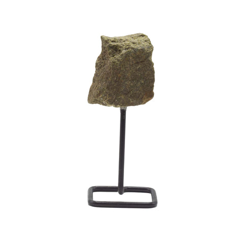 Epidote mineral specimen, rough olive-brown stone shown from the front on a black metal stand
